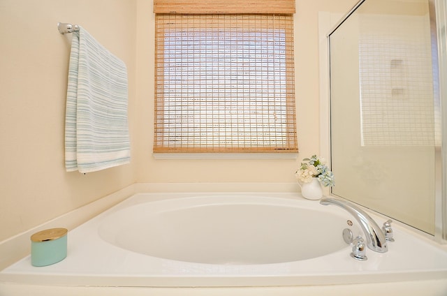 bathroom with a washtub