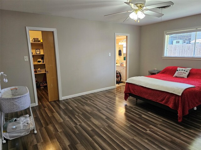 bedroom with connected bathroom, dark hardwood / wood-style floors, and ceiling fan