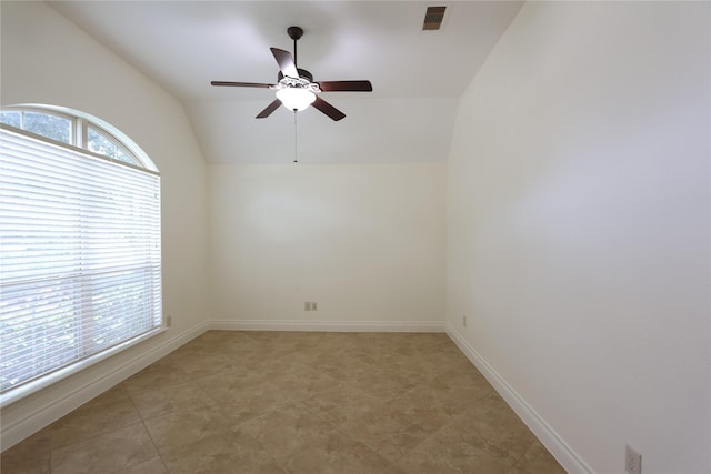 unfurnished room featuring ceiling fan and vaulted ceiling