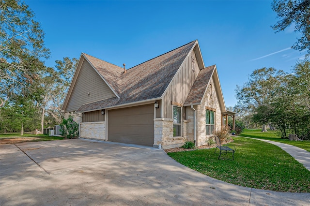 view of property exterior featuring a yard and a garage