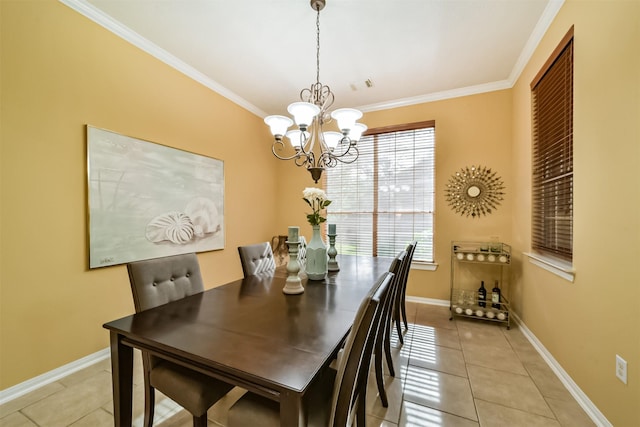 dining area featuring crown molding, light tile patterned flooring, and a chandelier