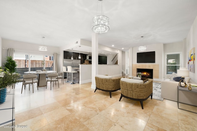 living room featuring a chandelier