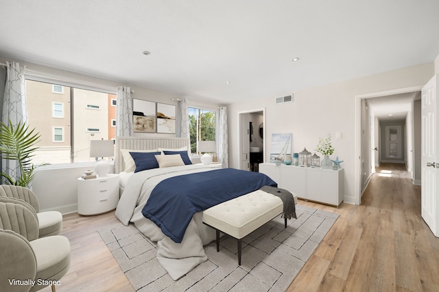 bedroom featuring light hardwood / wood-style flooring