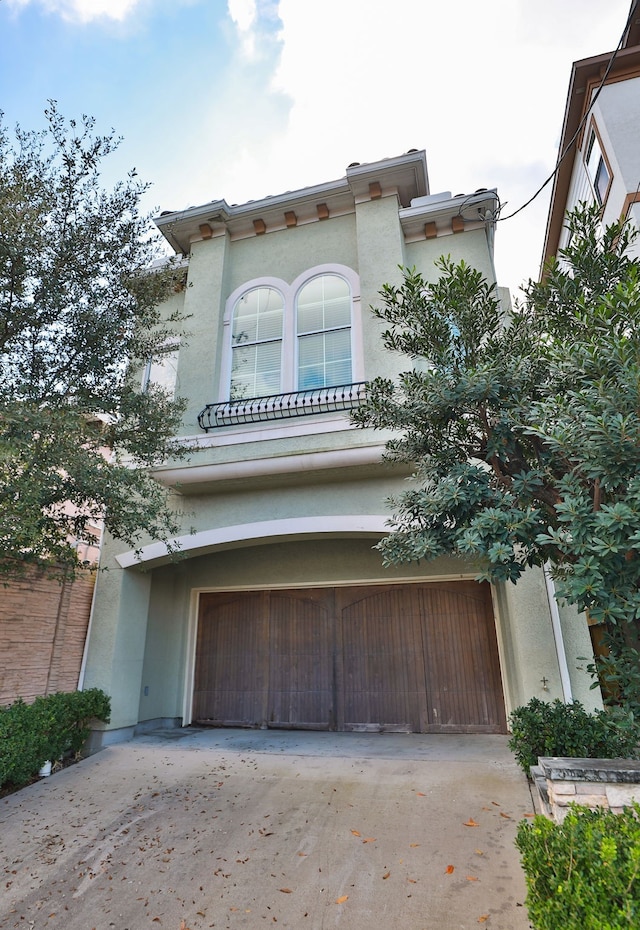 view of property exterior with a garage