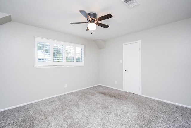 carpeted empty room with ceiling fan