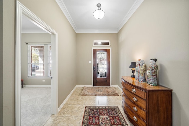 carpeted foyer featuring crown molding