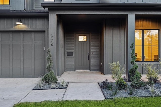 property entrance with a garage