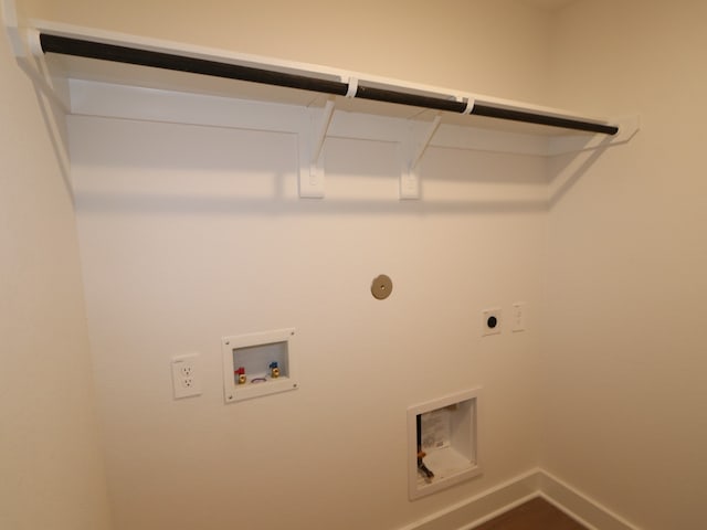 clothes washing area featuring baseboards, laundry area, electric dryer hookup, and hookup for a washing machine