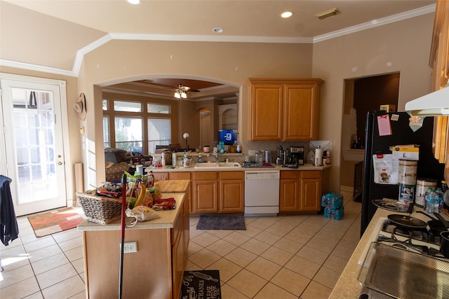 kitchen featuring dishwasher, ceiling fan, crown molding, and sink