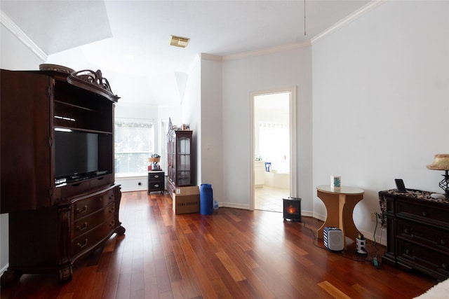 living room with dark wood-type flooring and ornamental molding