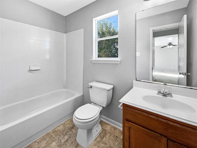 full bathroom with shower / bathing tub combination, ceiling fan, vanity, and toilet