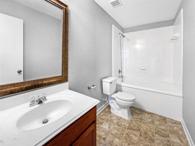 full bathroom with vanity, toilet, and tiled shower / bath