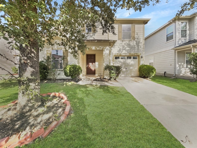 view of front of house with a front lawn and a garage