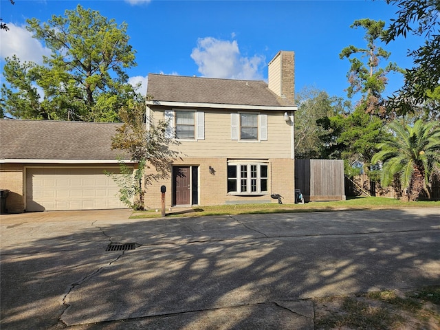 colonial home featuring a garage