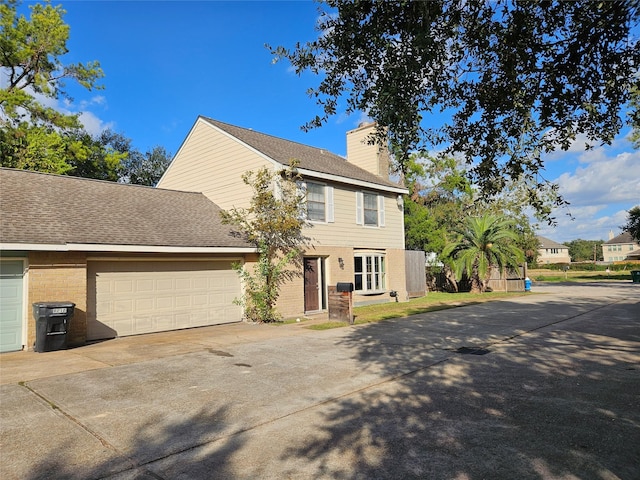 colonial home featuring a garage