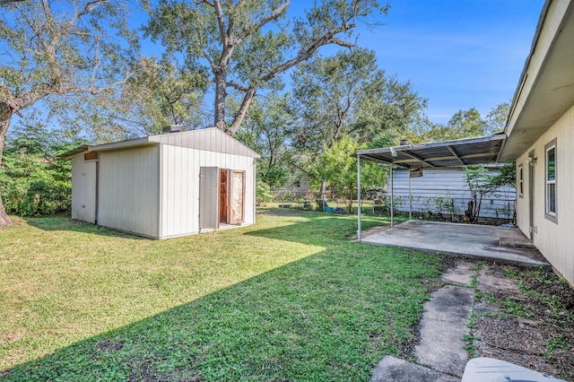 view of yard with a patio area and a shed