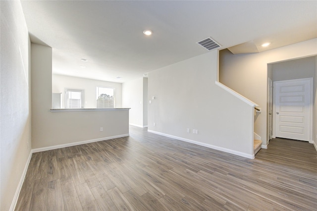 unfurnished room featuring wood-type flooring