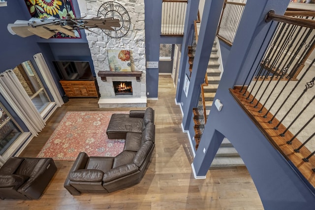 living room with a fireplace and hardwood / wood-style floors