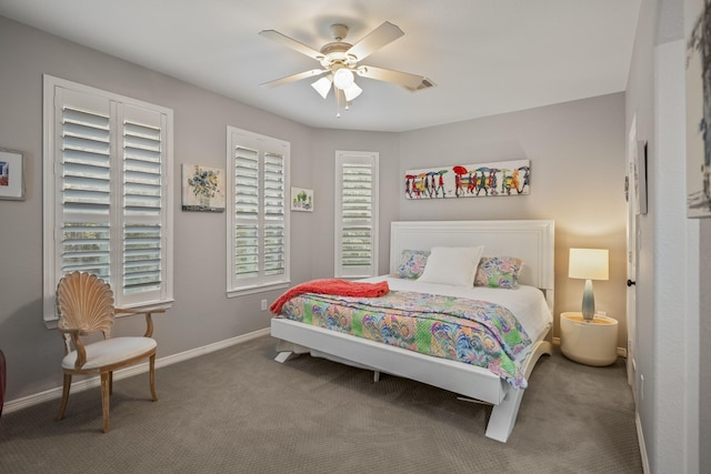 carpeted bedroom featuring ceiling fan