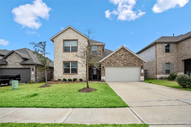 view of property with a garage and a front lawn