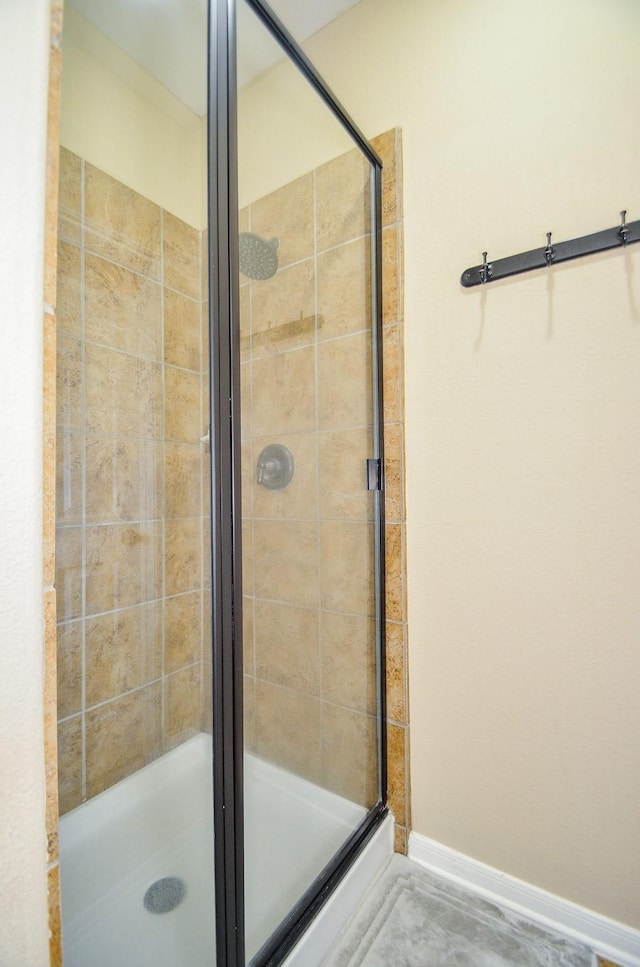 bathroom with an enclosed shower