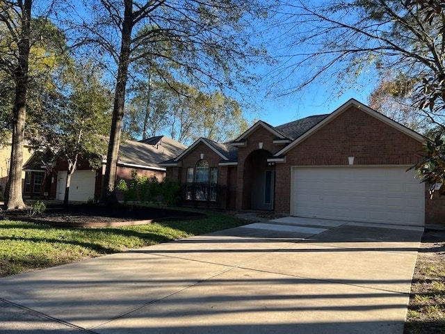 ranch-style house featuring a garage