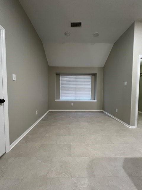 interior space featuring lofted ceiling