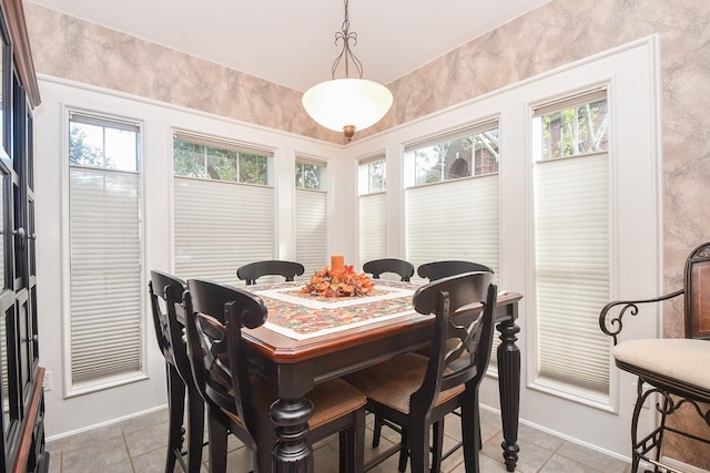 dining area featuring light tile patterned floors