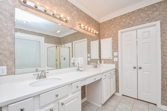 2446 Plantation Bend Dr, Sugar Land, TX 77478 - full bathroom with double vanity, a shower stall, tile patterned flooring, and crown molding