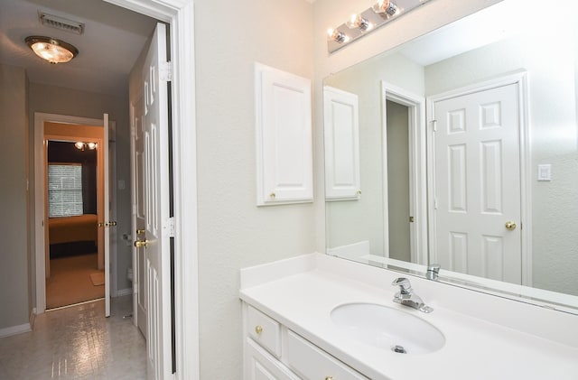 bathroom with wood-type flooring and vanity