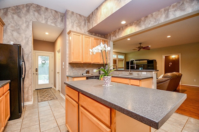 2446 Plantation Bend Dr, Sugar Land, TX 77478 - kitchen featuring freestanding refrigerator, open floor plan, dark countertops, plenty of natural light, and recessed lighting
