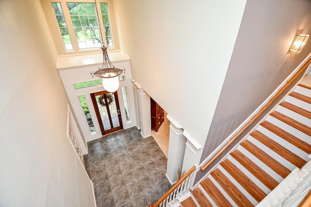 2446 Plantation Bend Dr, Sugar Land, TX 77478 - foyer featuring stairs and a high ceiling