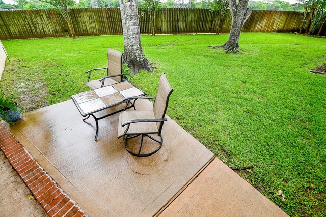2446 Plantation Bend Dr, Sugar Land, TX 77478 - view of yard with a patio area and outdoor dining area