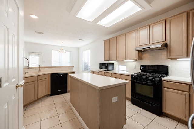 kitchen featuring a center island, an inviting chandelier, black appliances, hanging light fixtures, and light tile patterned floors