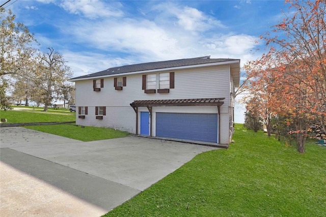 front facade featuring a front yard and a garage