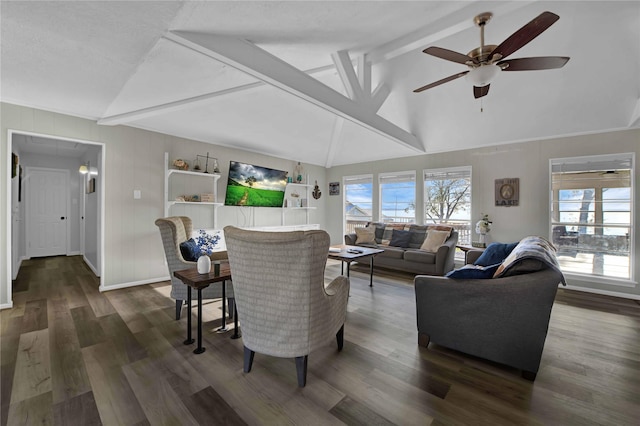 living room with lofted ceiling with beams, ceiling fan, and dark hardwood / wood-style floors