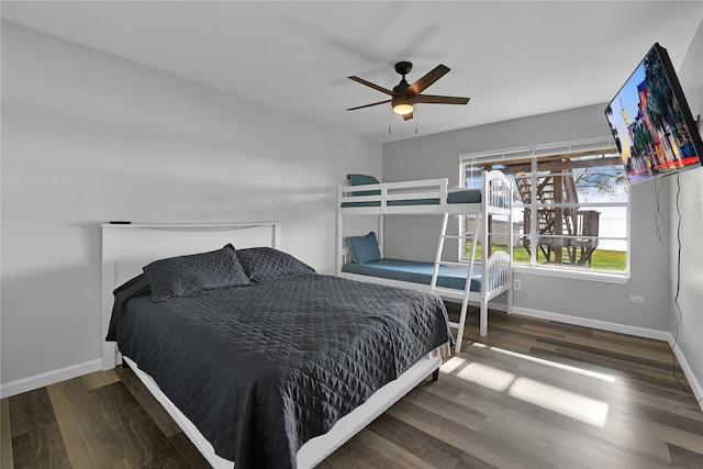 bedroom featuring dark hardwood / wood-style flooring and ceiling fan