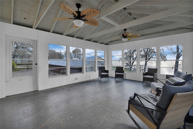 unfurnished sunroom with wood ceiling, ceiling fan, and lofted ceiling with beams