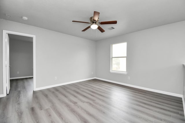 spare room with light wood-type flooring