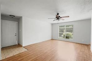 empty room with hardwood / wood-style flooring