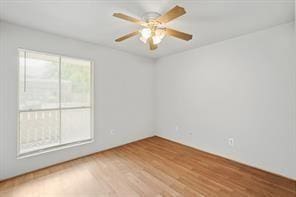 unfurnished room featuring hardwood / wood-style floors