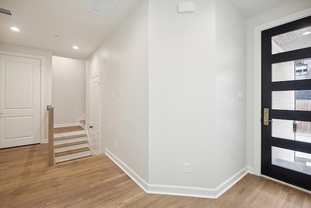 foyer with hardwood / wood-style flooring