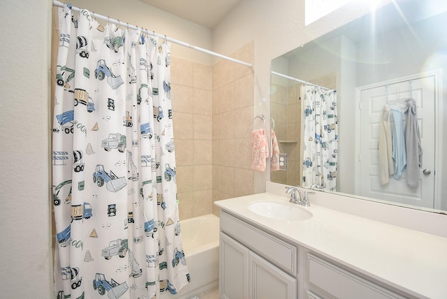 bathroom with vanity and shower / bath combo with shower curtain