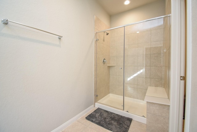 bathroom featuring tile patterned floors and walk in shower