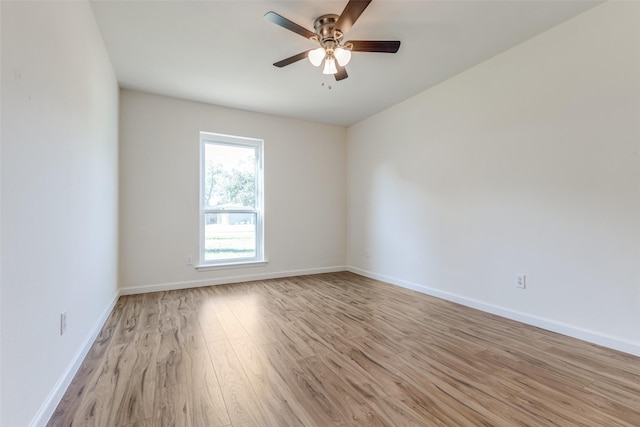 unfurnished room with ceiling fan and light hardwood / wood-style flooring