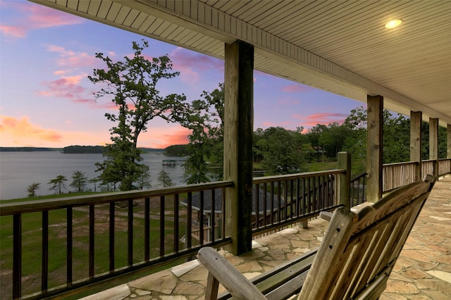 exterior space with a water view