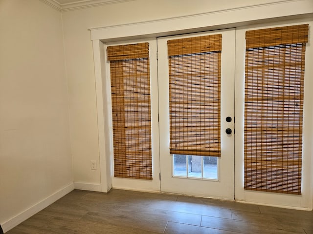 entryway featuring hardwood / wood-style floors and french doors