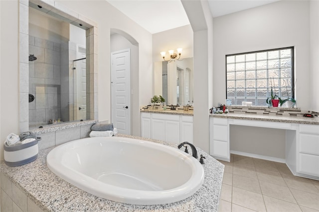 bathroom featuring vanity, tile patterned floors, and independent shower and bath