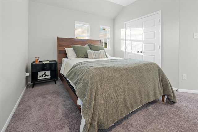 carpeted bedroom featuring vaulted ceiling