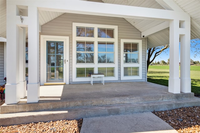 entrance to property with a porch